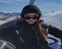 The star is a big fan of adventure sports like snowboarding.